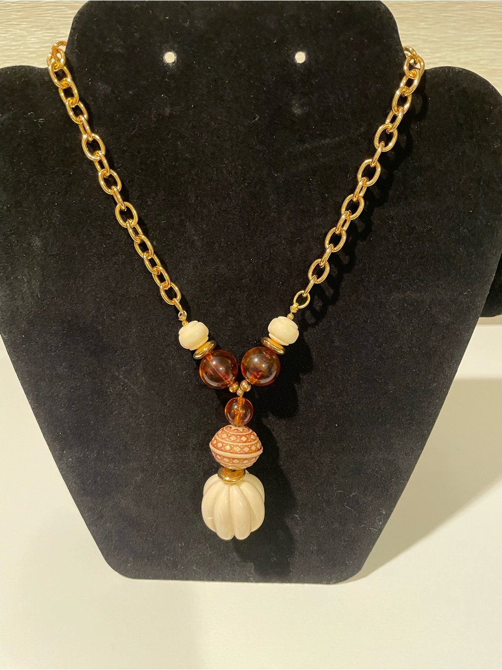 Gold-Tone Necklace with Cream and Amber Bead Pendant